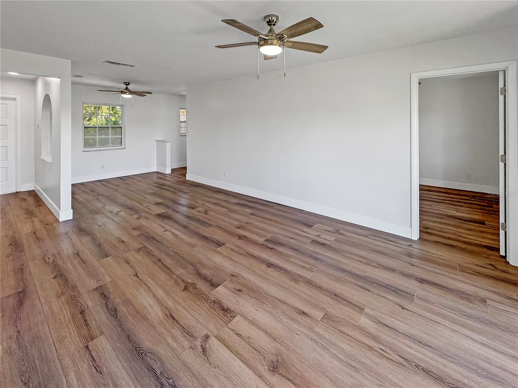 Undisclosed Address Seminole, FL 33777 - Photo 21 of 21 wooden floor in an empty room with a window