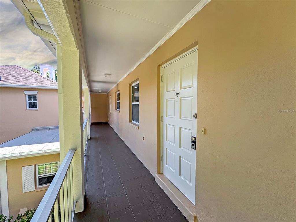 Undisclosed Address Seminole, FL 33777 - Photo 4 of 21 a view of a hallway with white walls