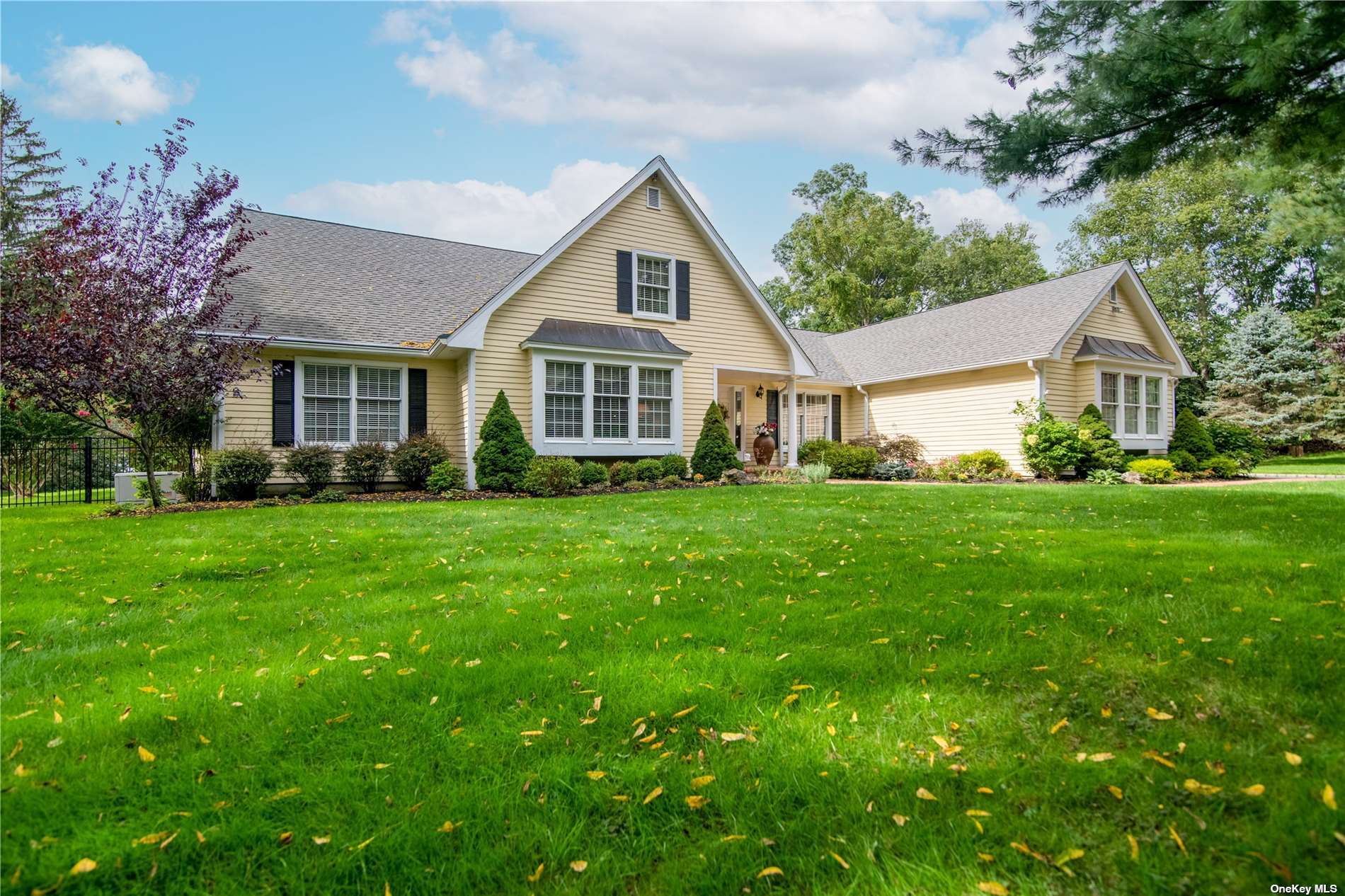 502 Long Beach Road Nissequogue, NY 11780 - Photo 1 of 1 a front view of house with yard and green space