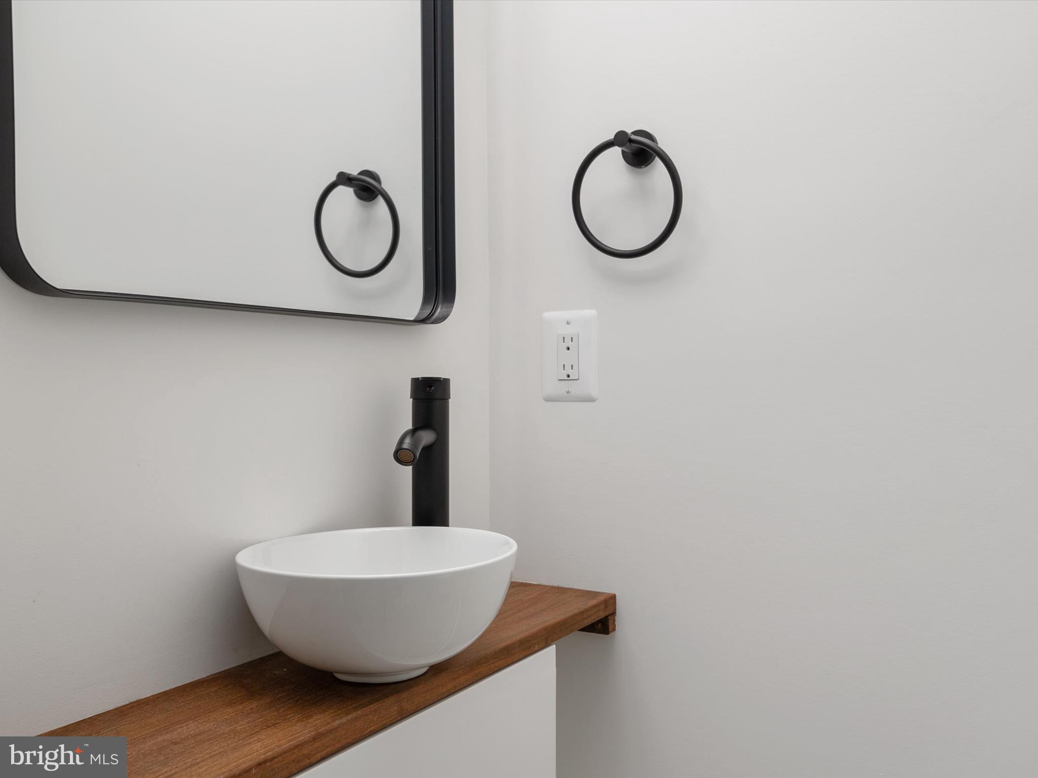 1422 Howard Road Annapolis, MD 21403 - Photo 11 of 61 Main Level Powder Room with custom sink vanity