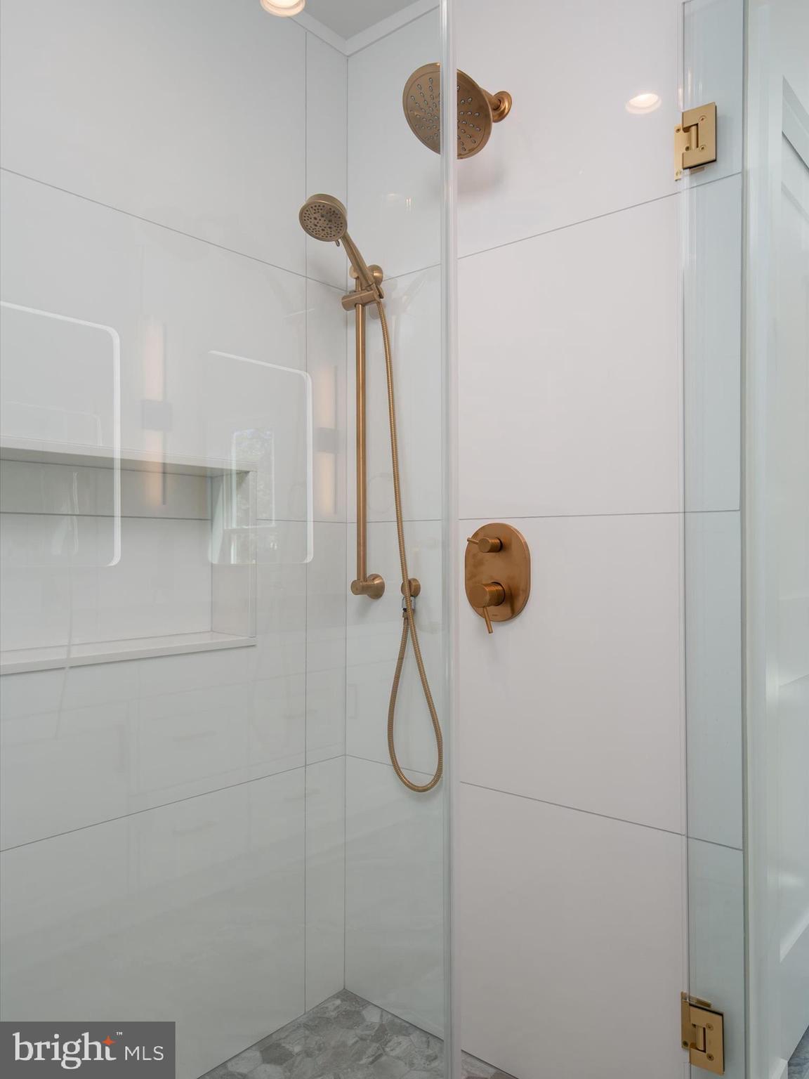 1422 Howard Road Annapolis, MD 21403 - Photo 16 of 61 Primary Curb-less Shower with elegant finishes