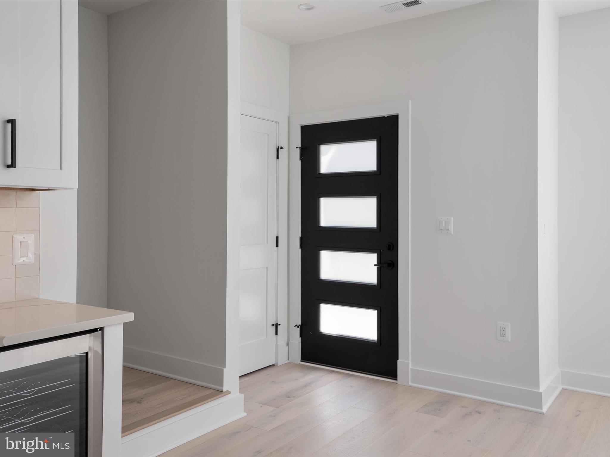 1422 Howard Road Annapolis, MD 21403 - Photo 7 of 61 Front Door Entry - opens to kitchen and dry-bar