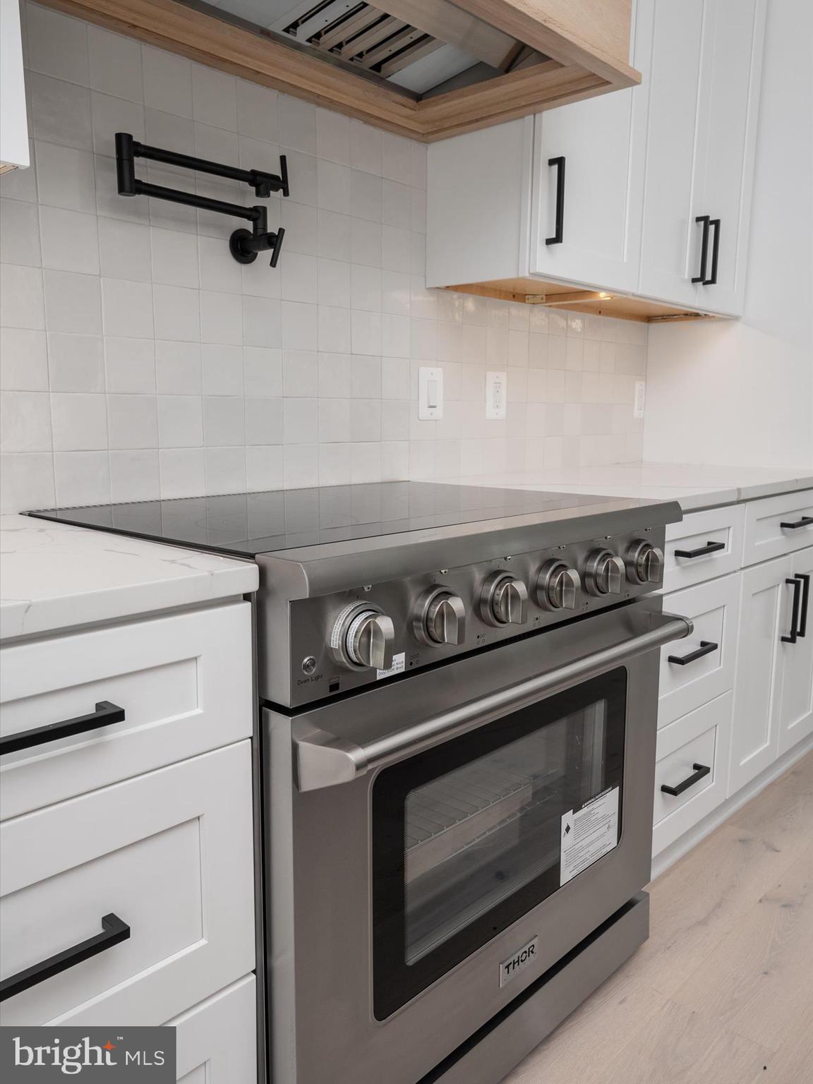 1422 Howard Road Annapolis, MD 21403 - Photo 8 of 61 Custom-built hood, pot-filler & 36 inch range