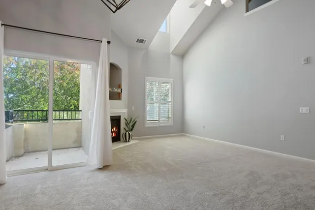 a kitchen with granite countertop a stove and a sink