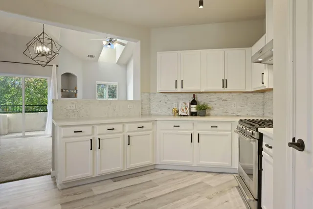 a view of a bathroom from a hallway