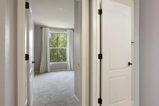 an empty room with a bathroom