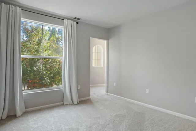 a view of room with racks on the wall