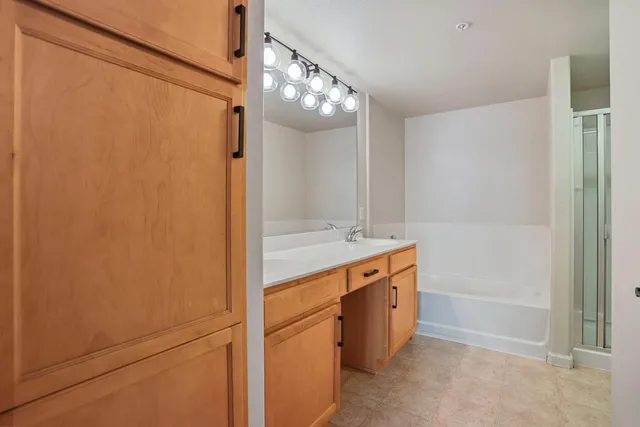 a view of a tree in front of a house