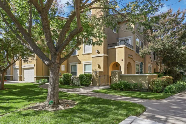 a backyard of a house with lots of green space