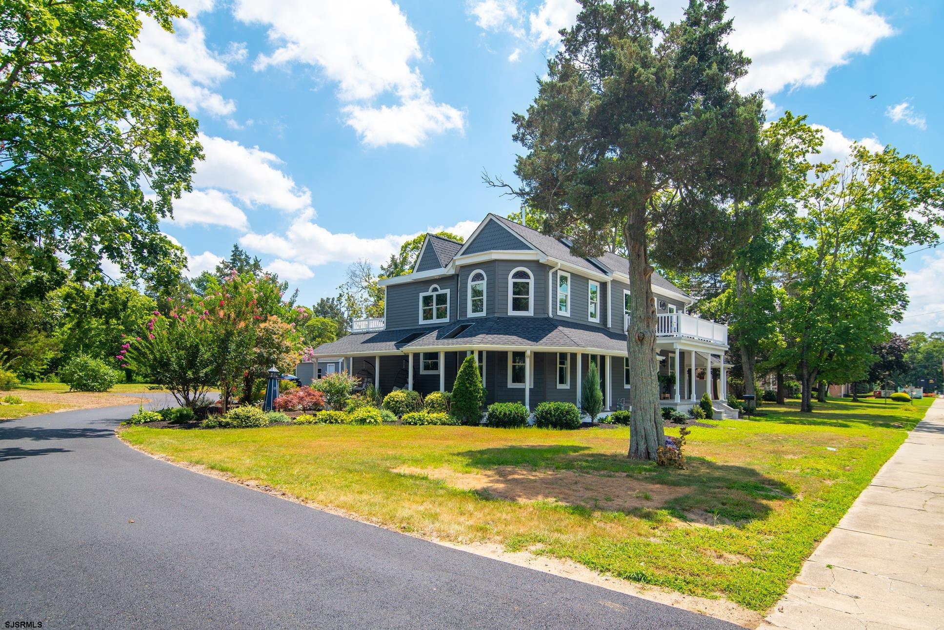 a view of swimming pool with outdoor seating and yard