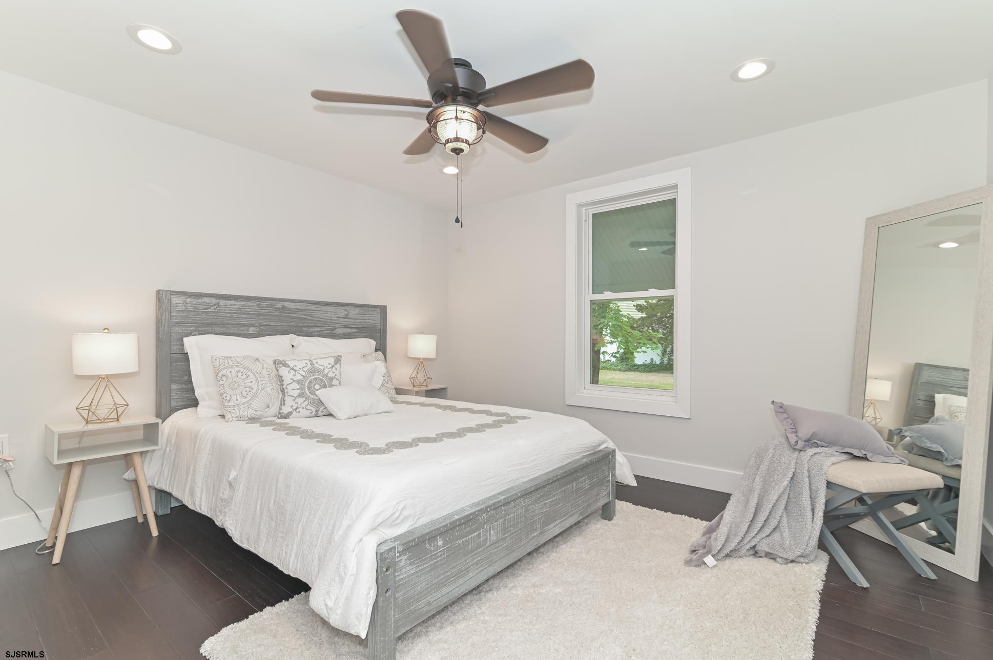 1828 Shore Road Linwood, NJ 08221 - Photo 11 of 20 a bedroom with a bed and a window