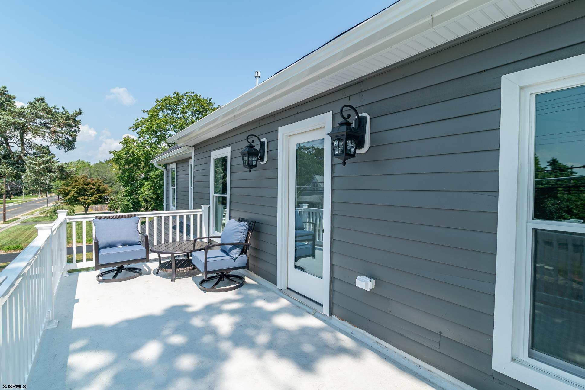 1828 Shore Road Linwood, NJ 08221 - Photo 19 of 20 a view of a chair and table in the balcony