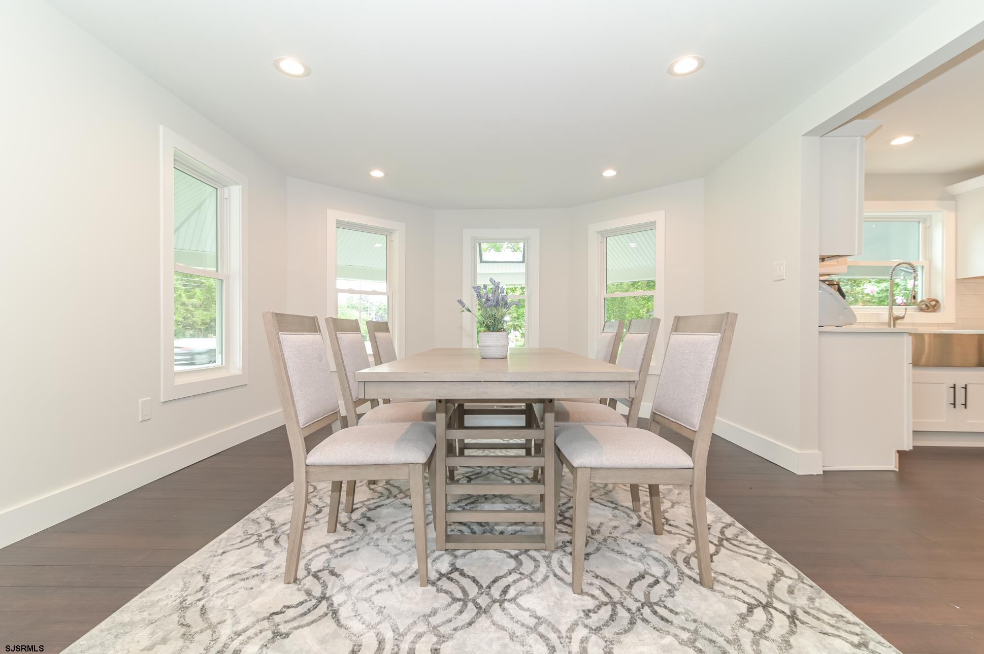 1828 Shore Road Linwood, NJ 08221 - Photo 8 of 20 a view of a dining room with furniture and wooden floor