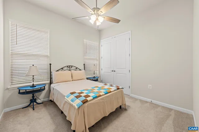 a bathroom with a sink toilet and a mirror