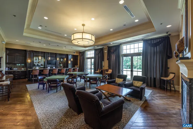 a gym room that has a lot of gym equipment