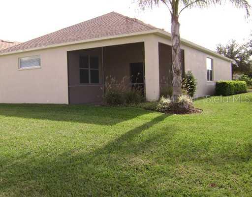 14203 Tree Swallow Way Lakewood Ranch, FL 34202 - Photo 8 of 9 Exterior Back