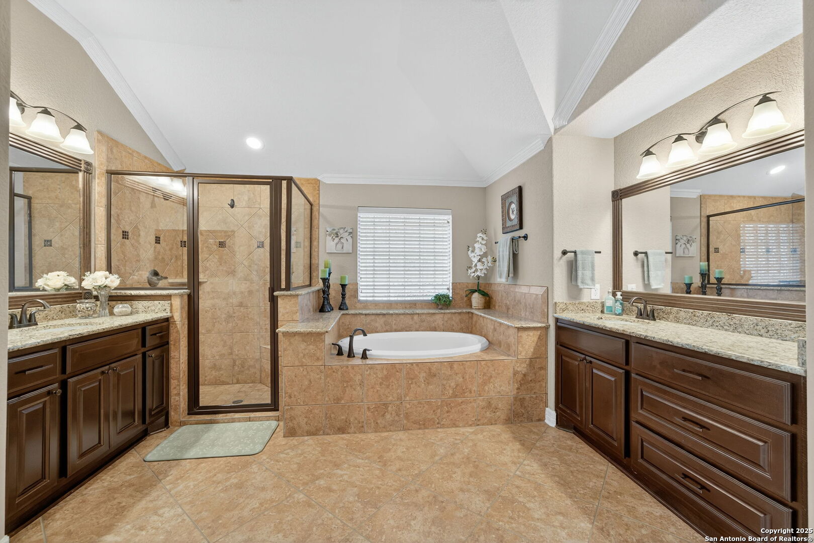 30210 Setterfeld Circle Fair Oaks Ranch, TX 78015 - Photo 12 of 30 a spacious bathroom with a tub sink shower and mirror