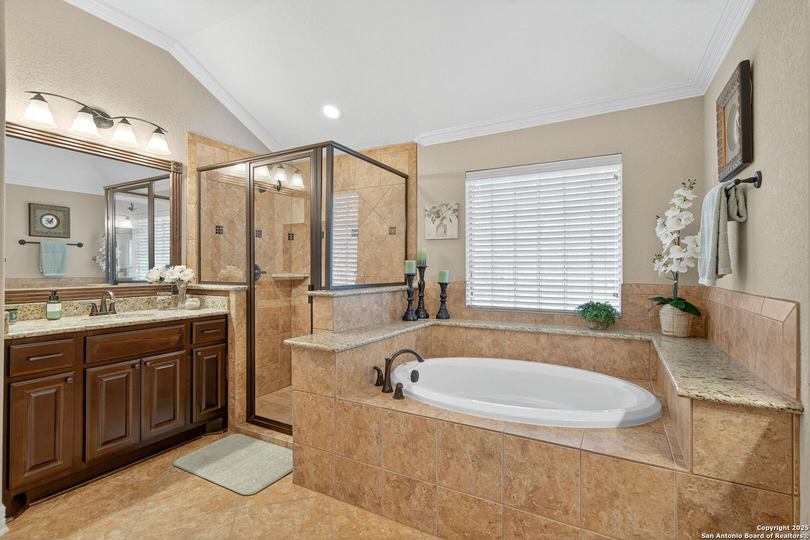 30210 Setterfeld Circle Fair Oaks Ranch, TX 78015 - Photo 13 of 30 a spacious bathroom with a tub sink and mirror
