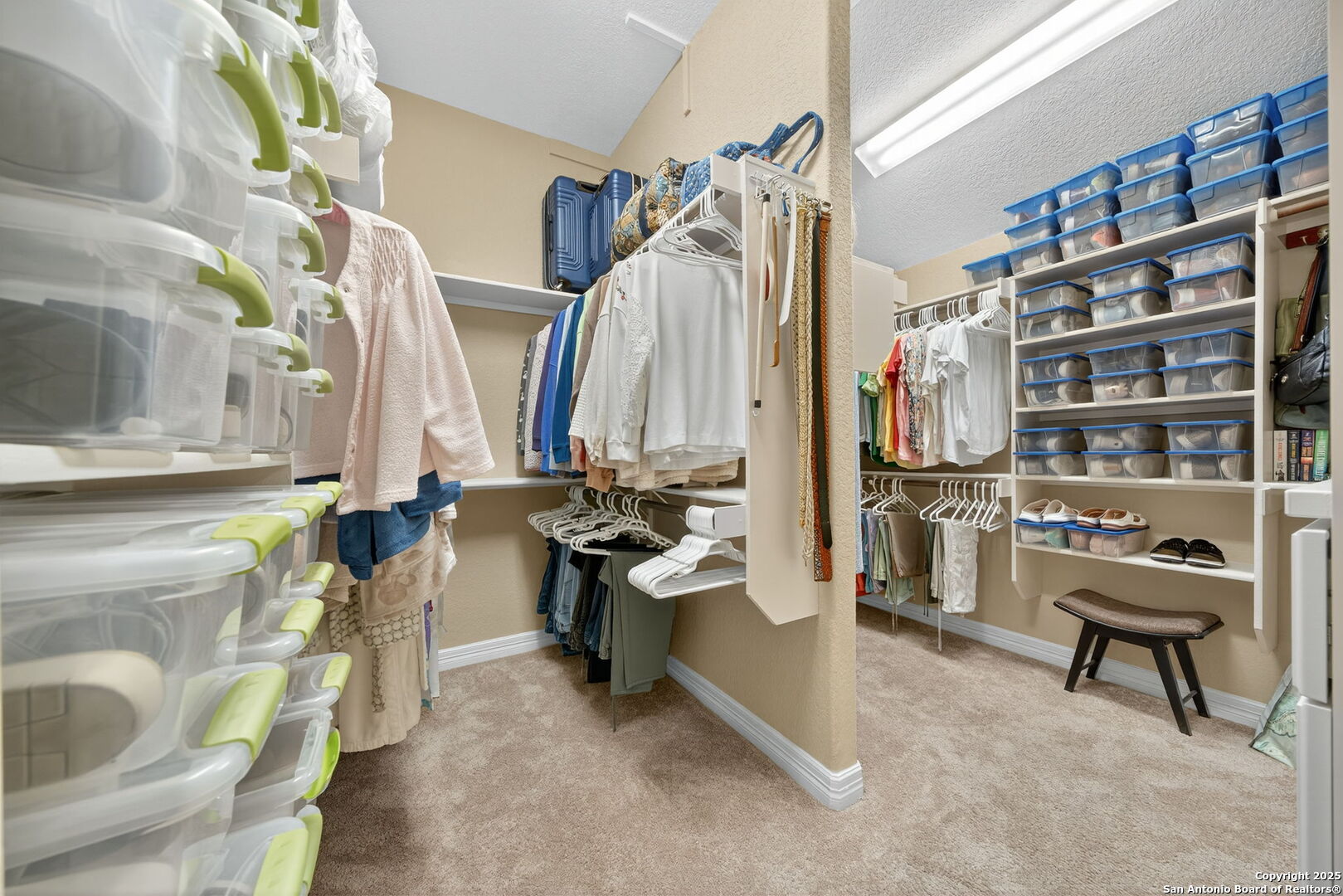 30210 Setterfeld Circle Fair Oaks Ranch, TX 78015 - Photo 14 of 30 a view of walk in closet with clothes and shoes