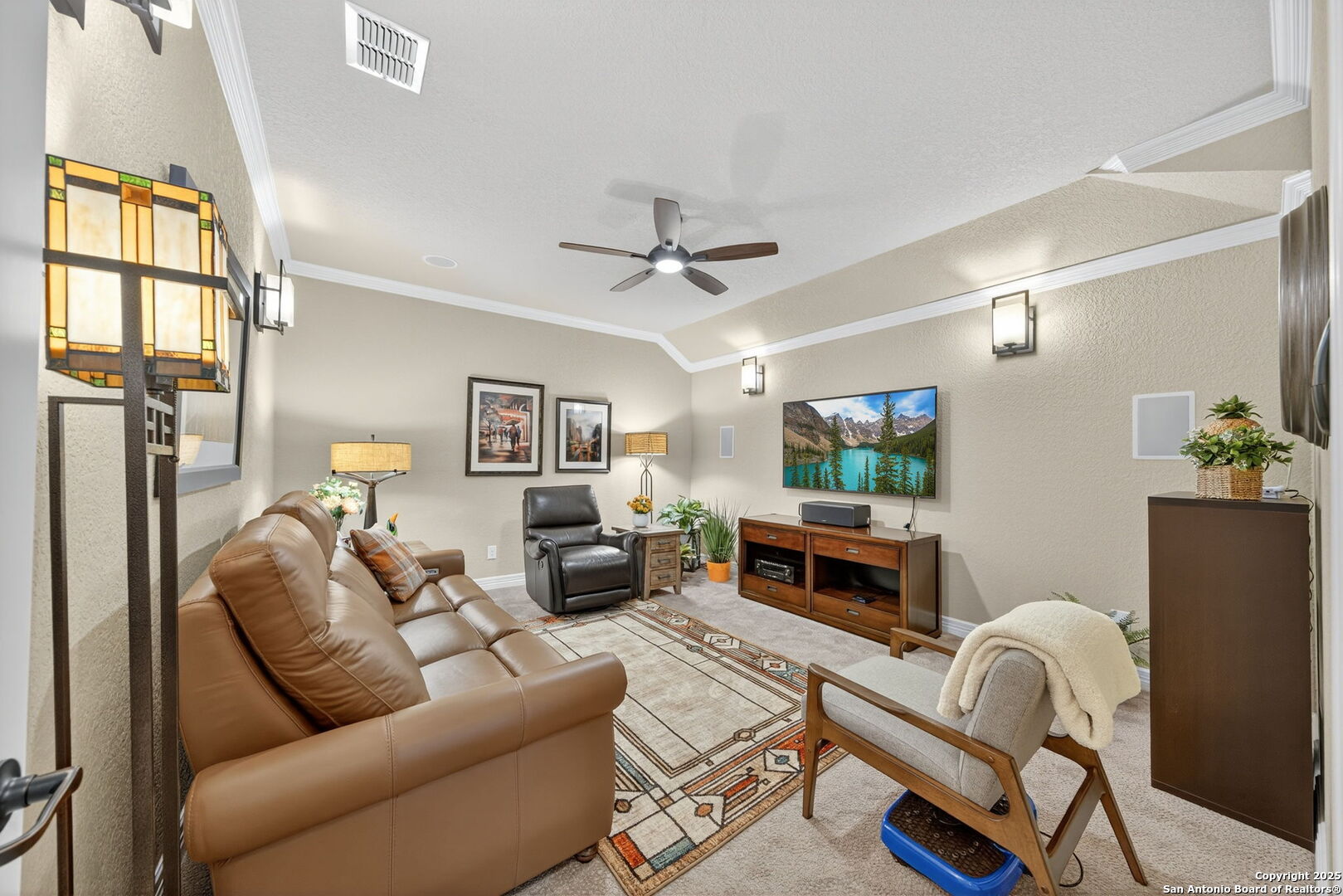 30210 Setterfeld Circle Fair Oaks Ranch, TX 78015 - Photo 17 of 30 a living room with furniture and a flat screen tv