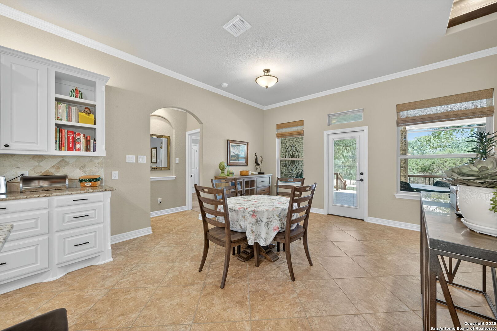 30210 Setterfeld Circle Fair Oaks Ranch, TX 78015 - Photo 9 of 30 a dining room with furniture and window