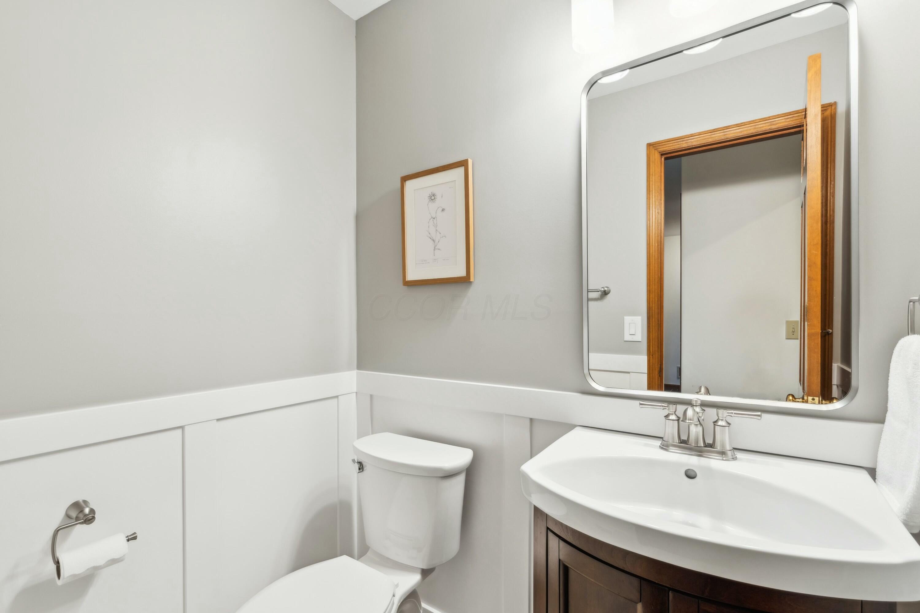 4052 Fenwick Road Columbus, OH 43220 - Photo 39 of 76 Main Level Half Bathroom