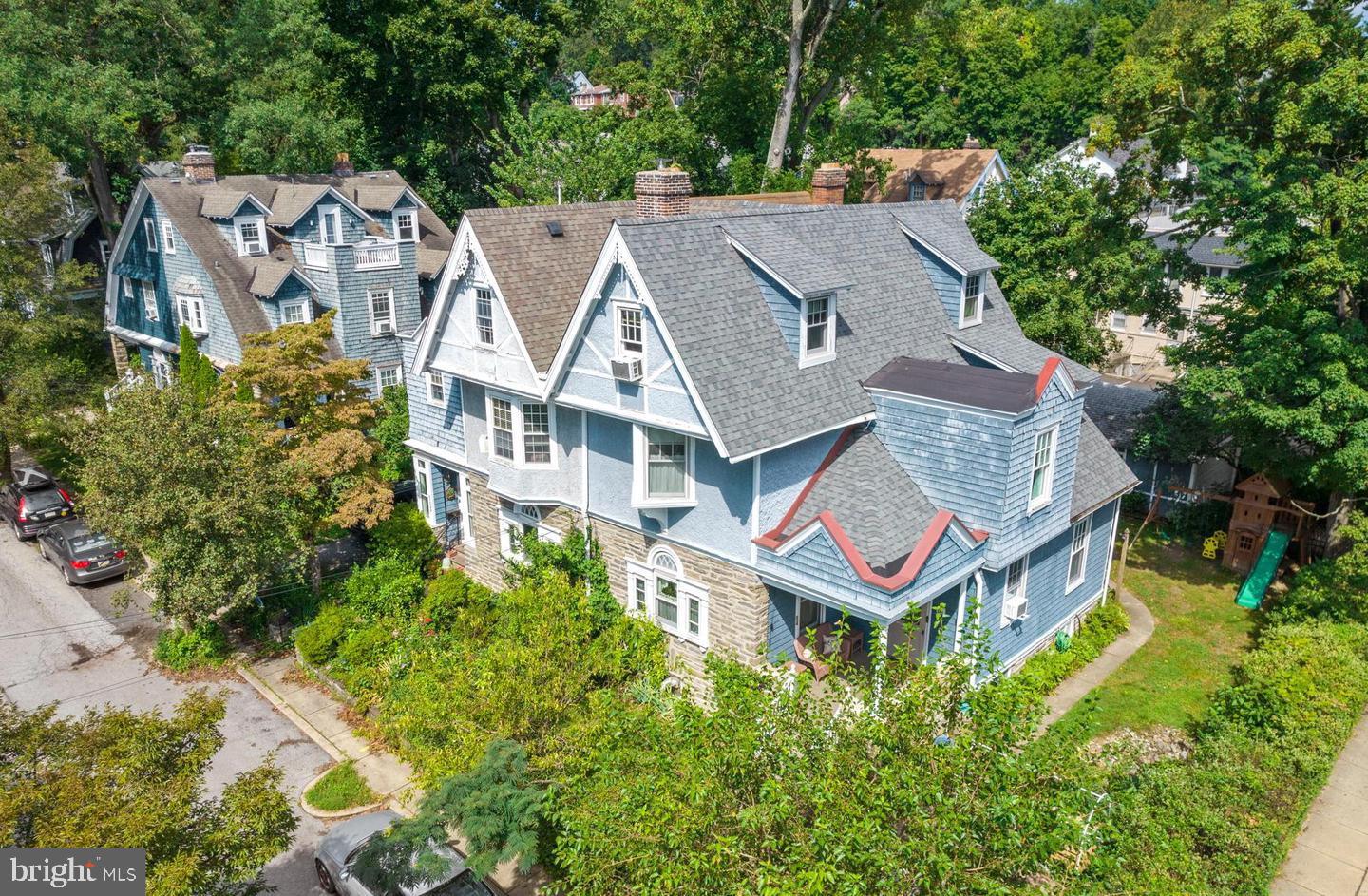 an aerial view of a house with a garden