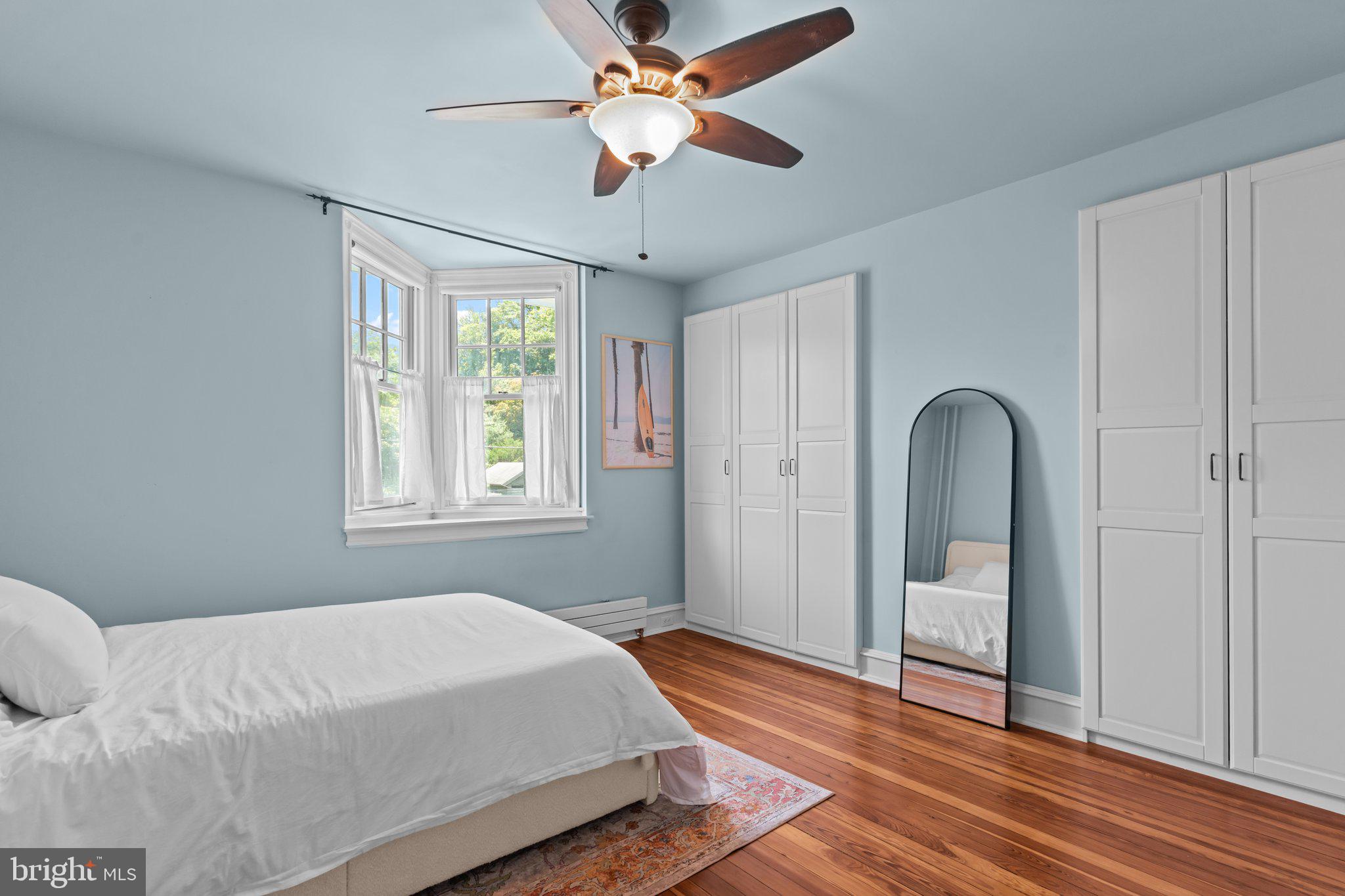 101 Cliff Terrace Wyncote, PA 19095 - Photo 11 of 21 a bedroom with a bed and a window