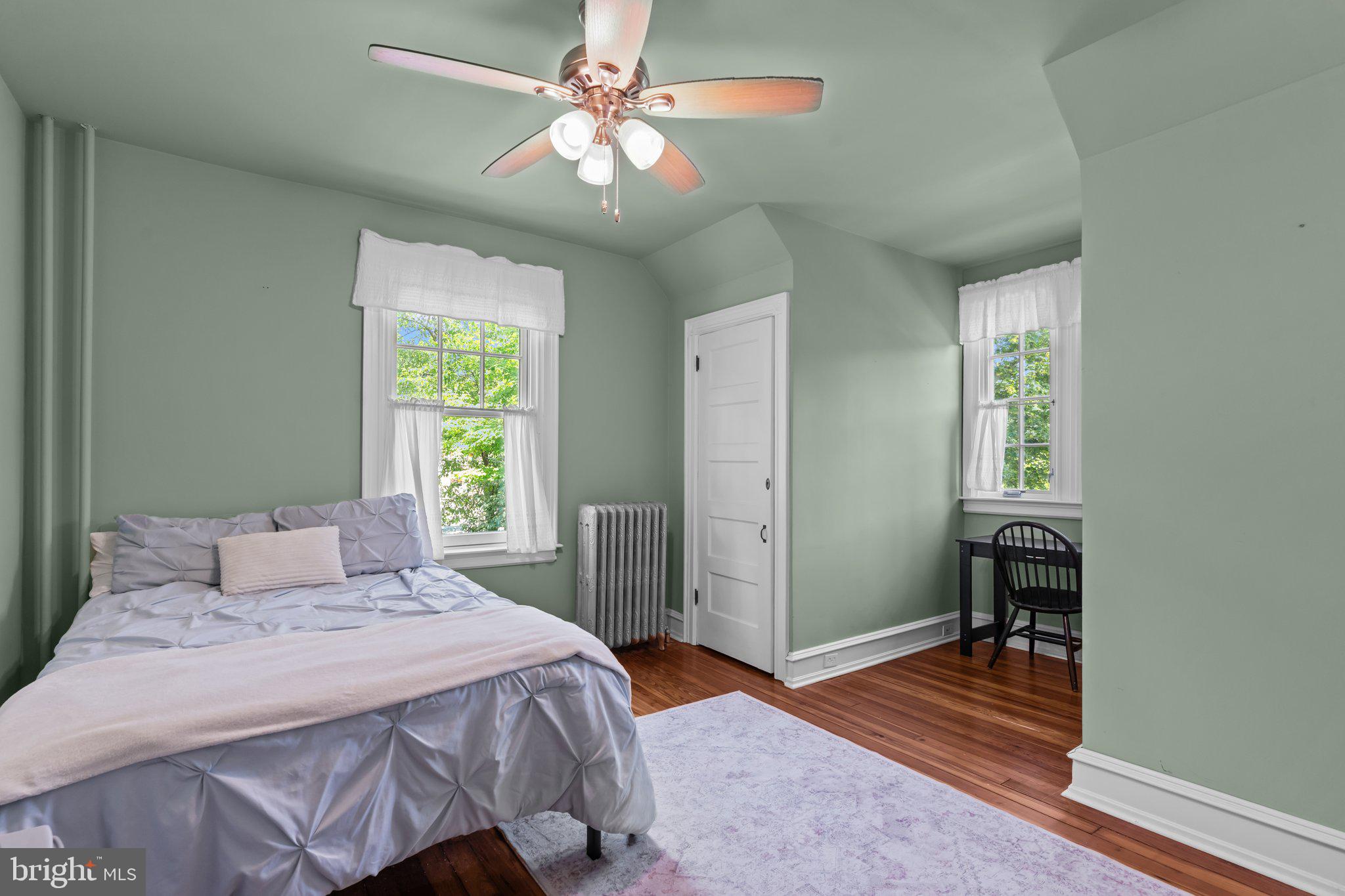 101 Cliff Terrace Wyncote, PA 19095 - Photo 12 of 21 a bedroom with a bed and a window