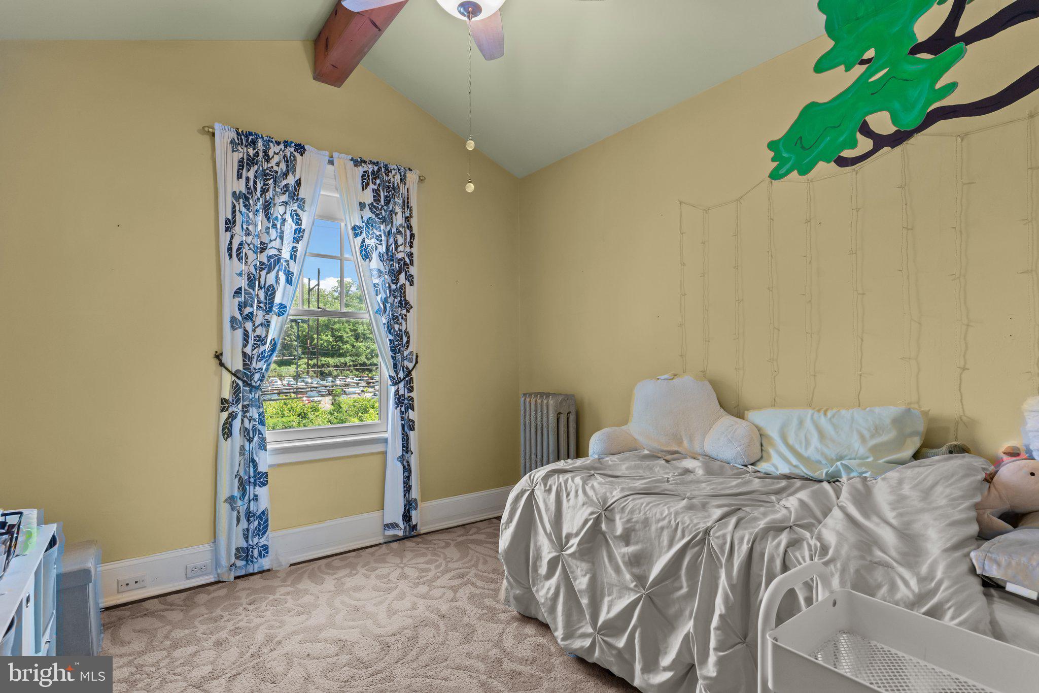 101 Cliff Terrace Wyncote, PA 19095 - Photo 14 of 21 a bedroom with a bed and a window