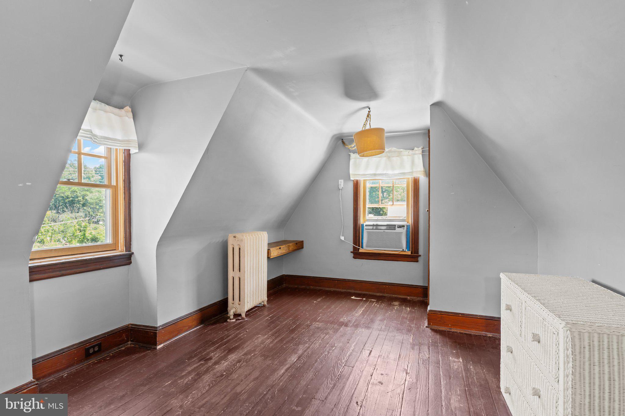 101 Cliff Terrace Wyncote, PA 19095 - Photo 15 of 21 a view of an empty room with wooden floor and a window