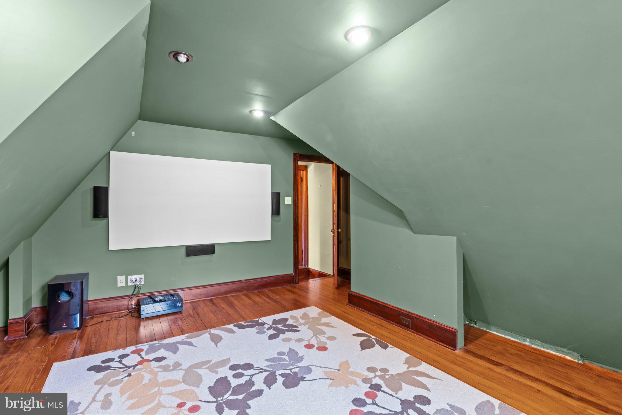 101 Cliff Terrace Wyncote, PA 19095 - Photo 16 of 21 a bedroom with a bed and wooden floor