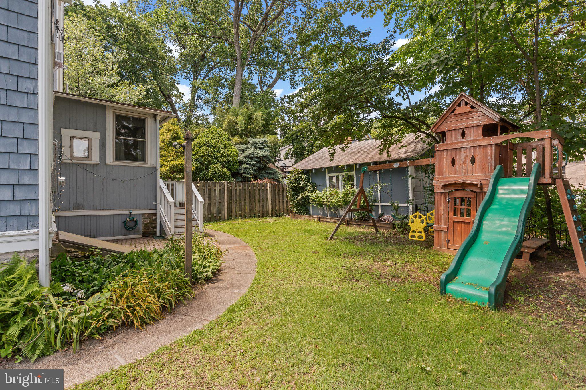 101 Cliff Terrace Wyncote, PA 19095 - Photo 18 of 21 a front view of a house with swimming pool