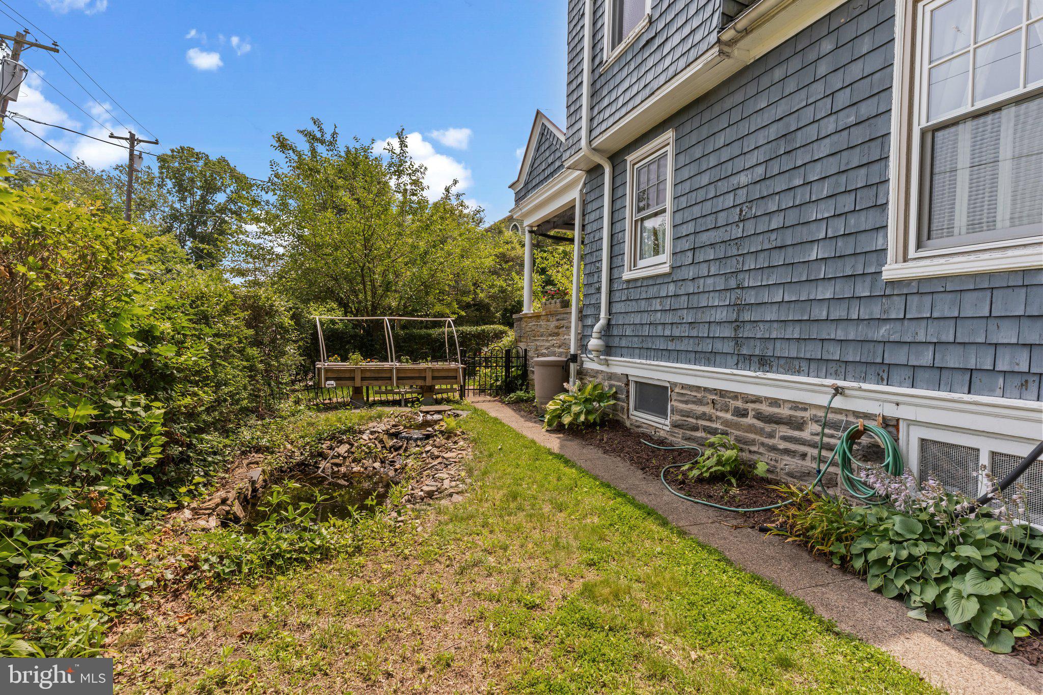 101 Cliff Terrace Wyncote, PA 19095 - Photo 21 of 21 a backyard of a house with lots of green space