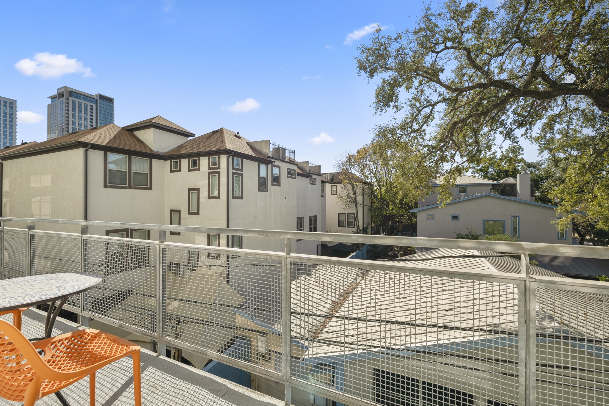 3311 Yupon Street, Unit 317 Houston, TX 77006 - Photo 11 of 29 a view of a house with a patio
