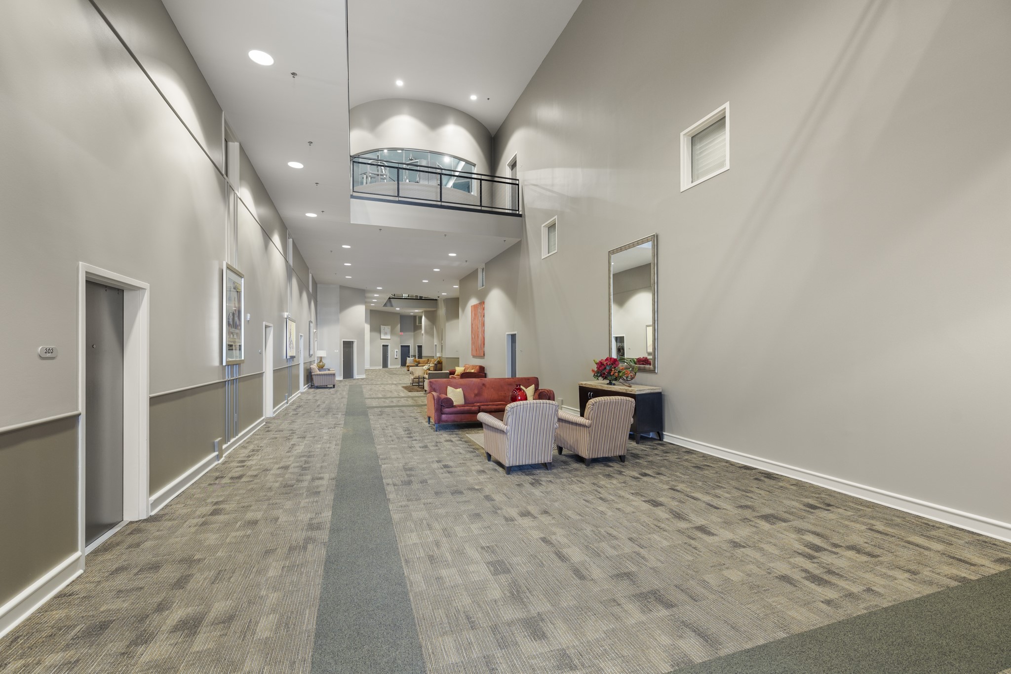 3311 Yupon Street, Unit 317 Houston, TX 77006 - Photo 3 of 29 a lobby with furniture and rug