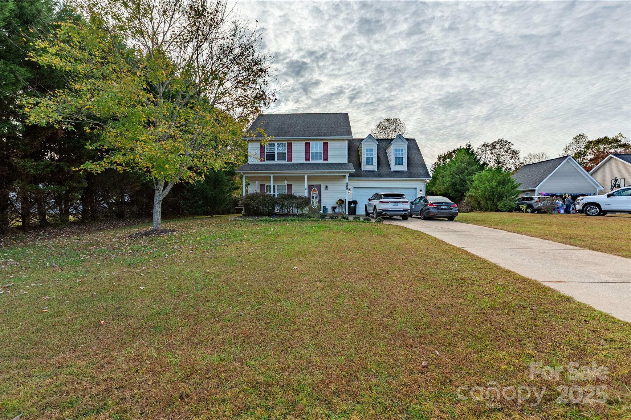 505 Coffeetree Lane Stanley, NC 28164 - Photo 2 of 37 a front view of a house with a yard