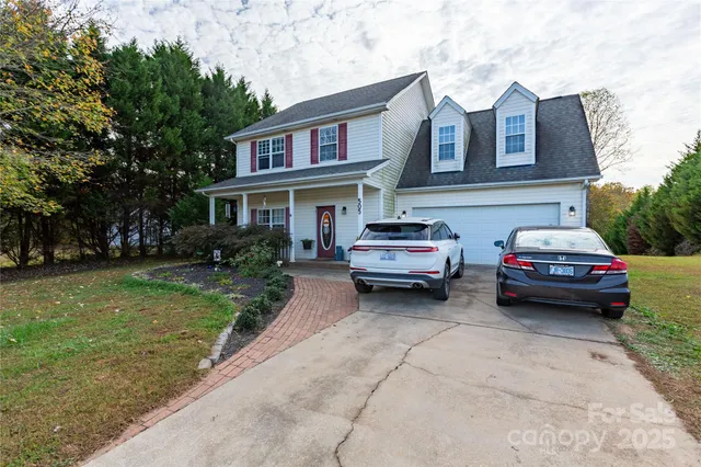 a car parked in front of a house