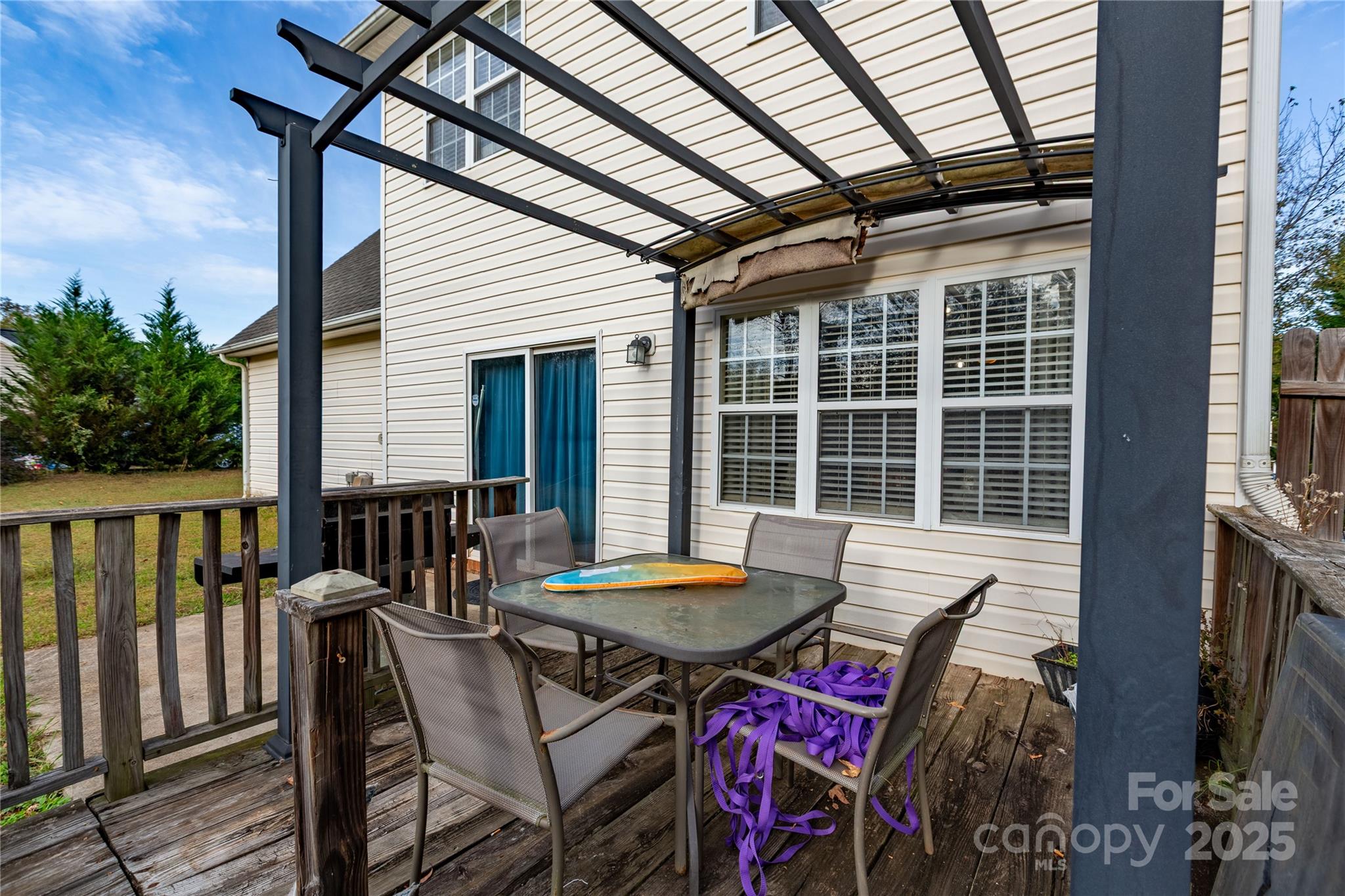 505 Coffeetree Lane Stanley, NC 28164 - Photo 35 of 37 a view of a table and chairs in the balcony