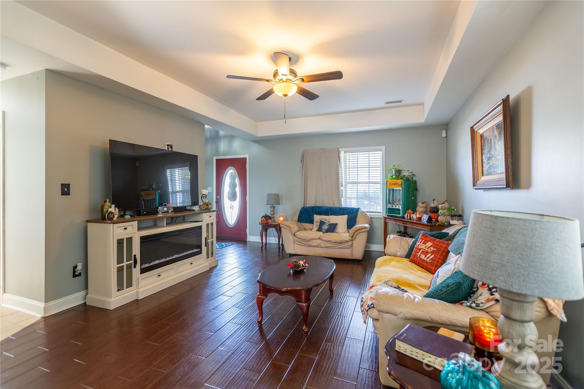 505 Coffeetree Lane Stanley, NC 28164 - Photo 7 of 37 a living room with furniture and a flat screen tv
