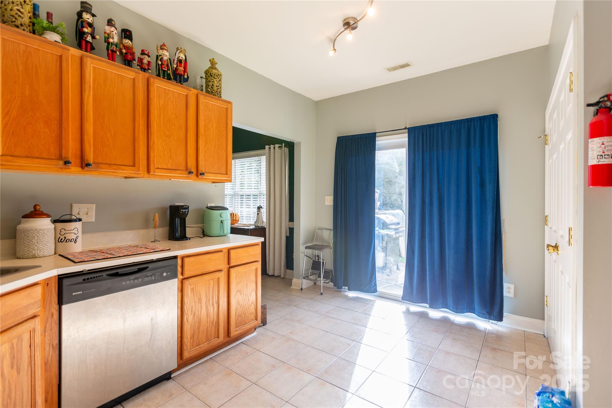 505 Coffeetree Lane Stanley, NC 28164 - Photo 8 of 37 a kitchen with stainless steel appliances granite countertop a refrigerator and a sink