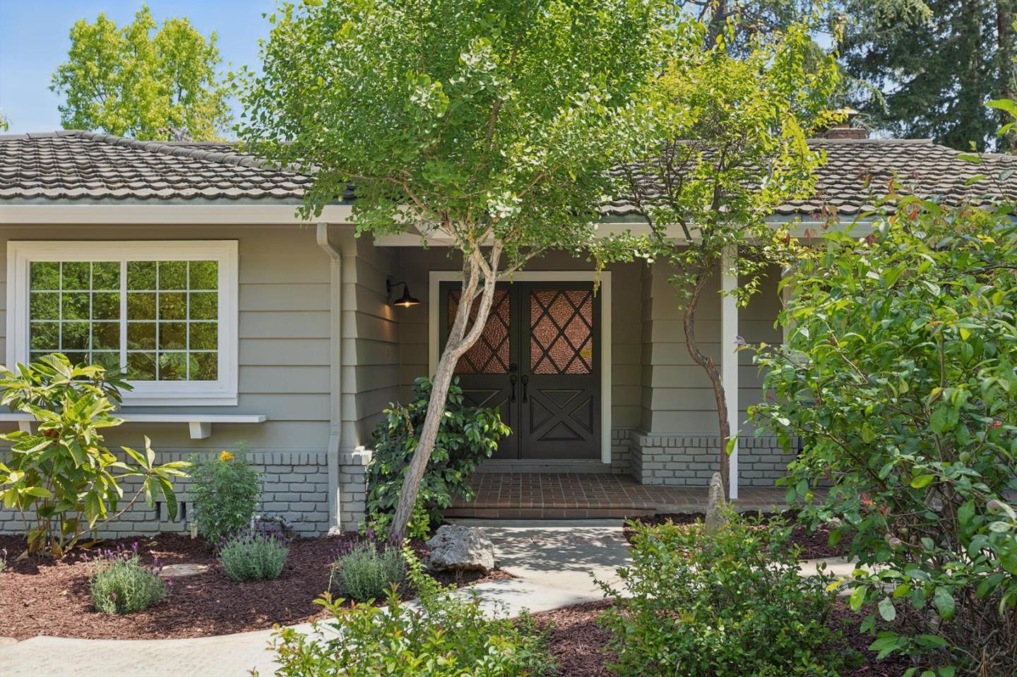 755 Santa Rita Avenue Los Altos, CA 94022 - Photo 8 of 50 a front view of a house with garden