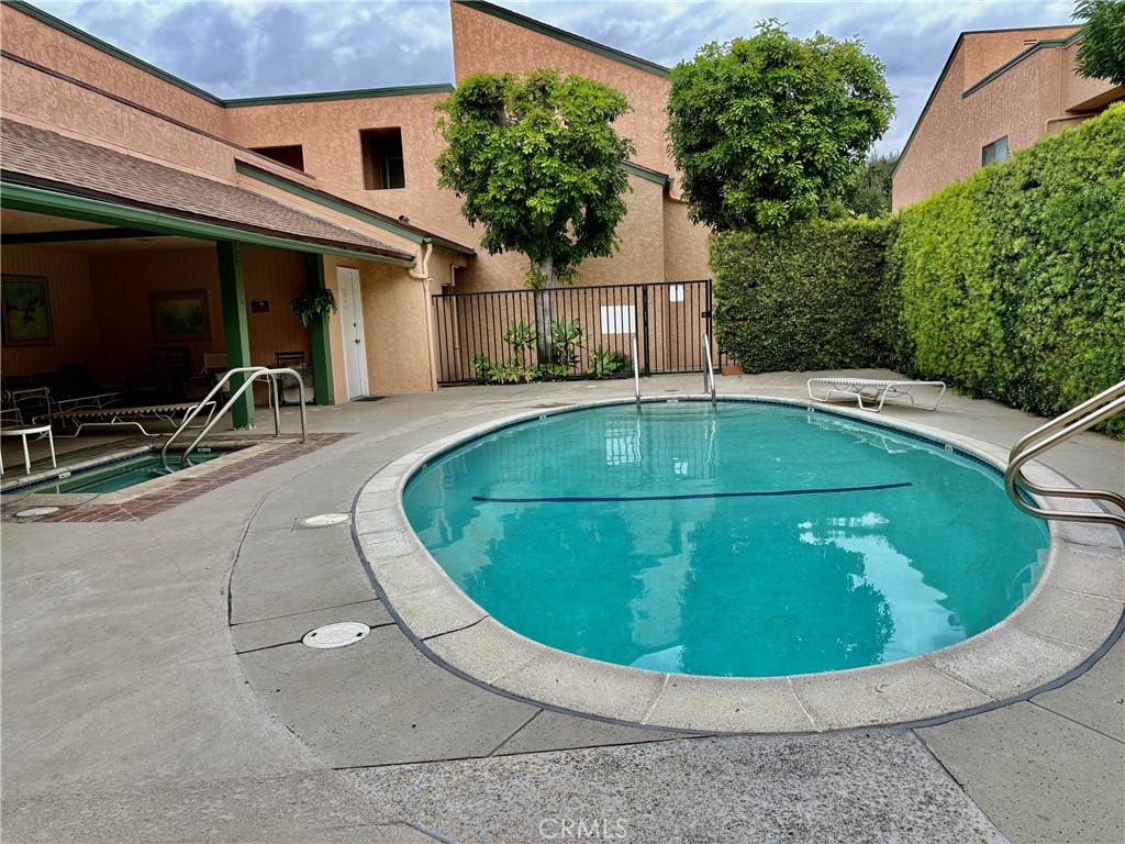 1126 Fairview Avenue, Unit 210 Arcadia, CA 91007 - Photo 11 of 16 a view of a swimming pool with a patio