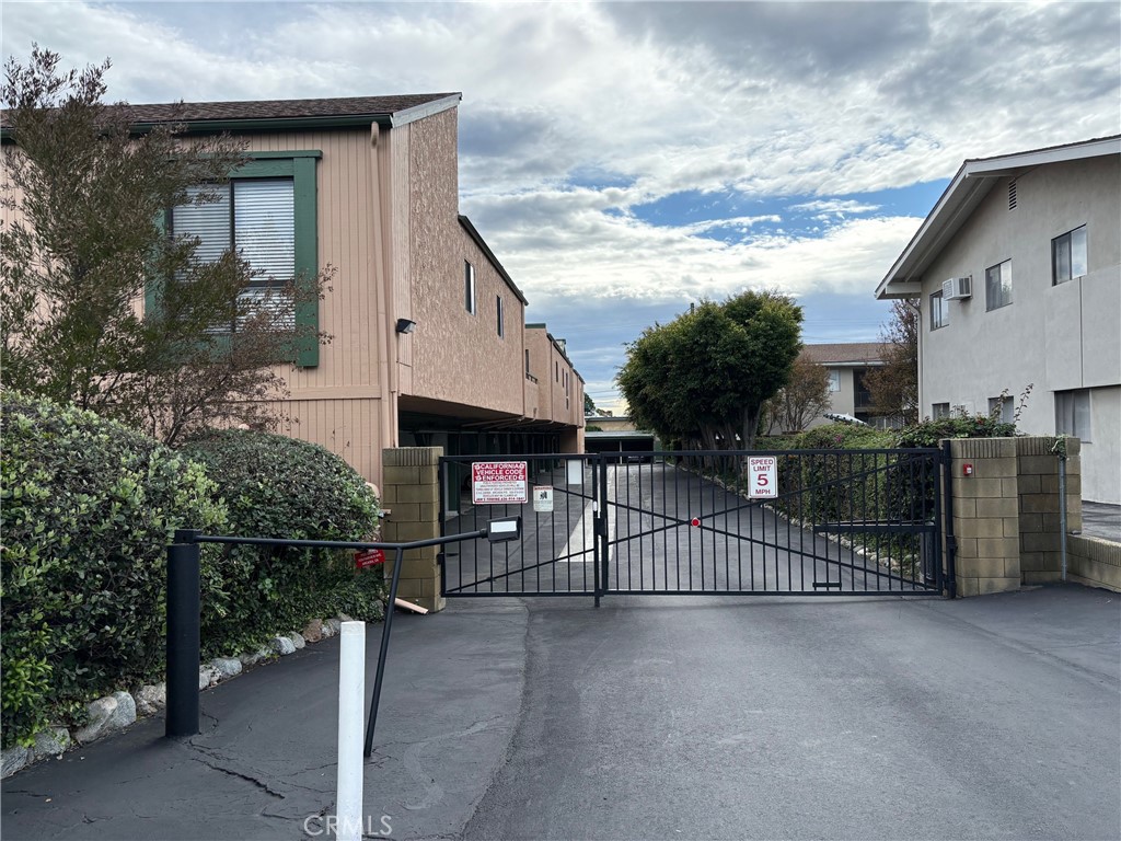 1126 Fairview Avenue, Unit 210 Arcadia, CA 91007 - Photo 15 of 16 a view of a house with iron fence