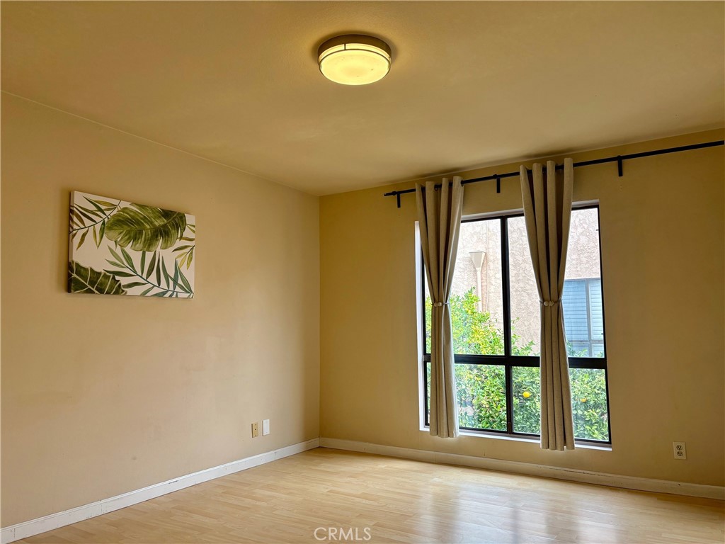 1126 Fairview Avenue, Unit 210 Arcadia, CA 91007 - Photo 8 of 16 an empty room with a window