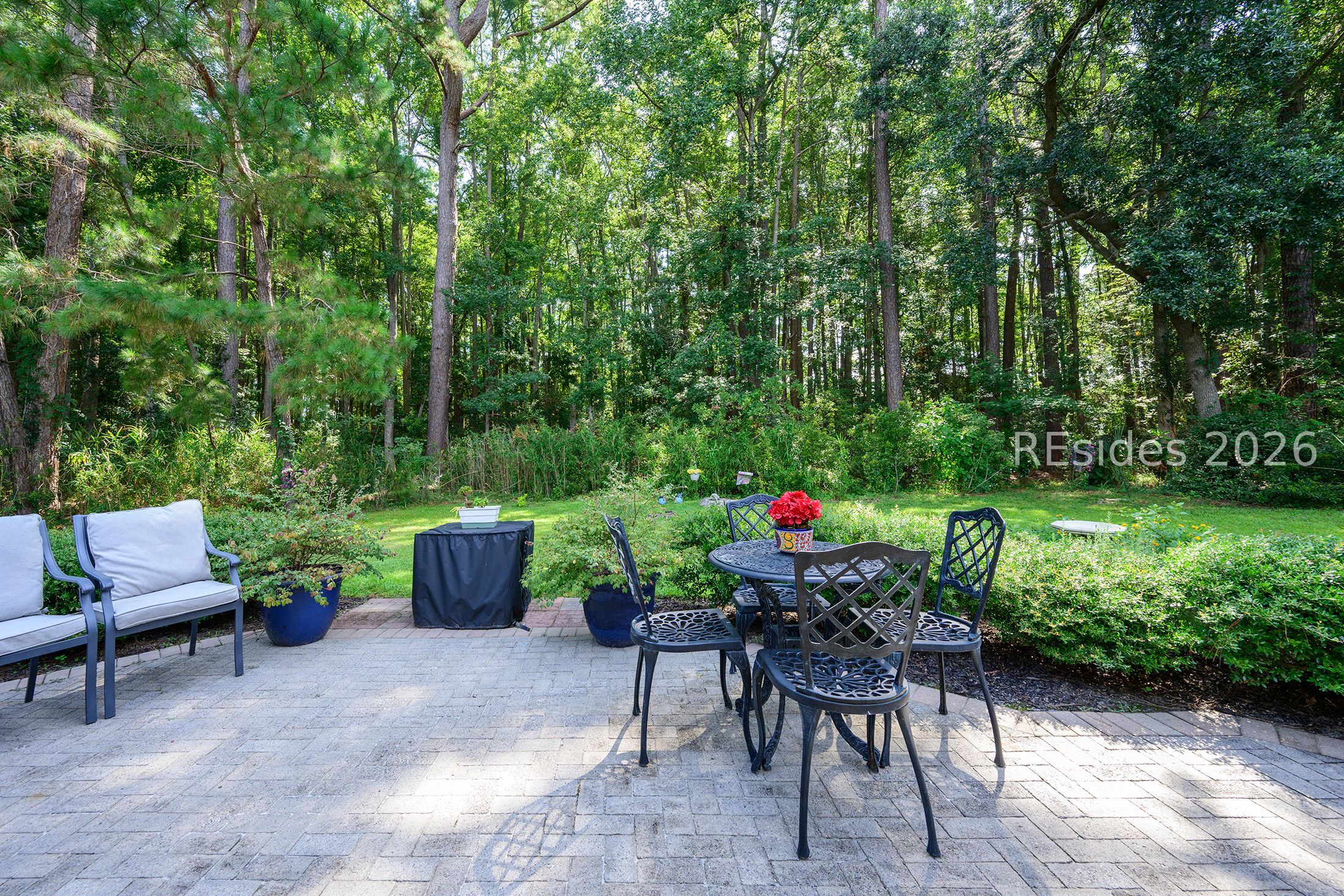 134 Commodore Dupont Street Bluffton, SC 29909 - Photo 40 of 40 Back yard wooded privacy, patio
