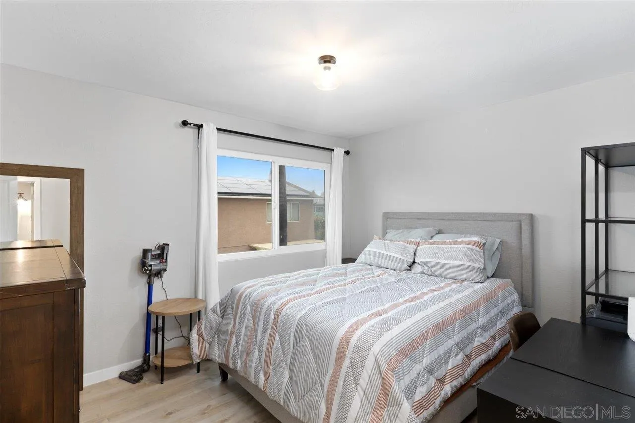 562 Tag Lane Ramona, CA 92065 - Photo 14 of 30 a bedroom with a bed and a window