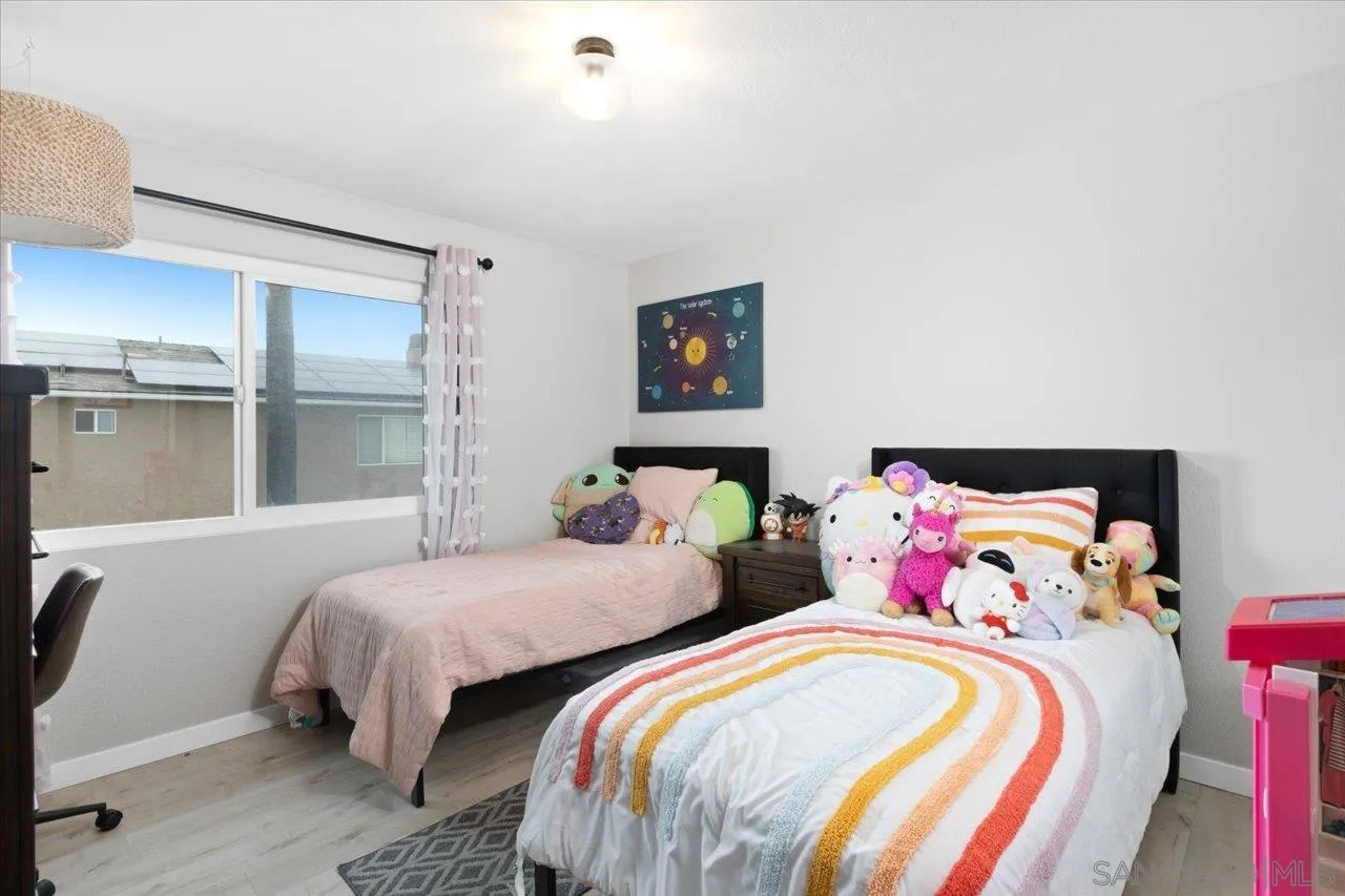 562 Tag Lane Ramona, CA 92065 - Photo 16 of 30 a bedroom with two beds and a window