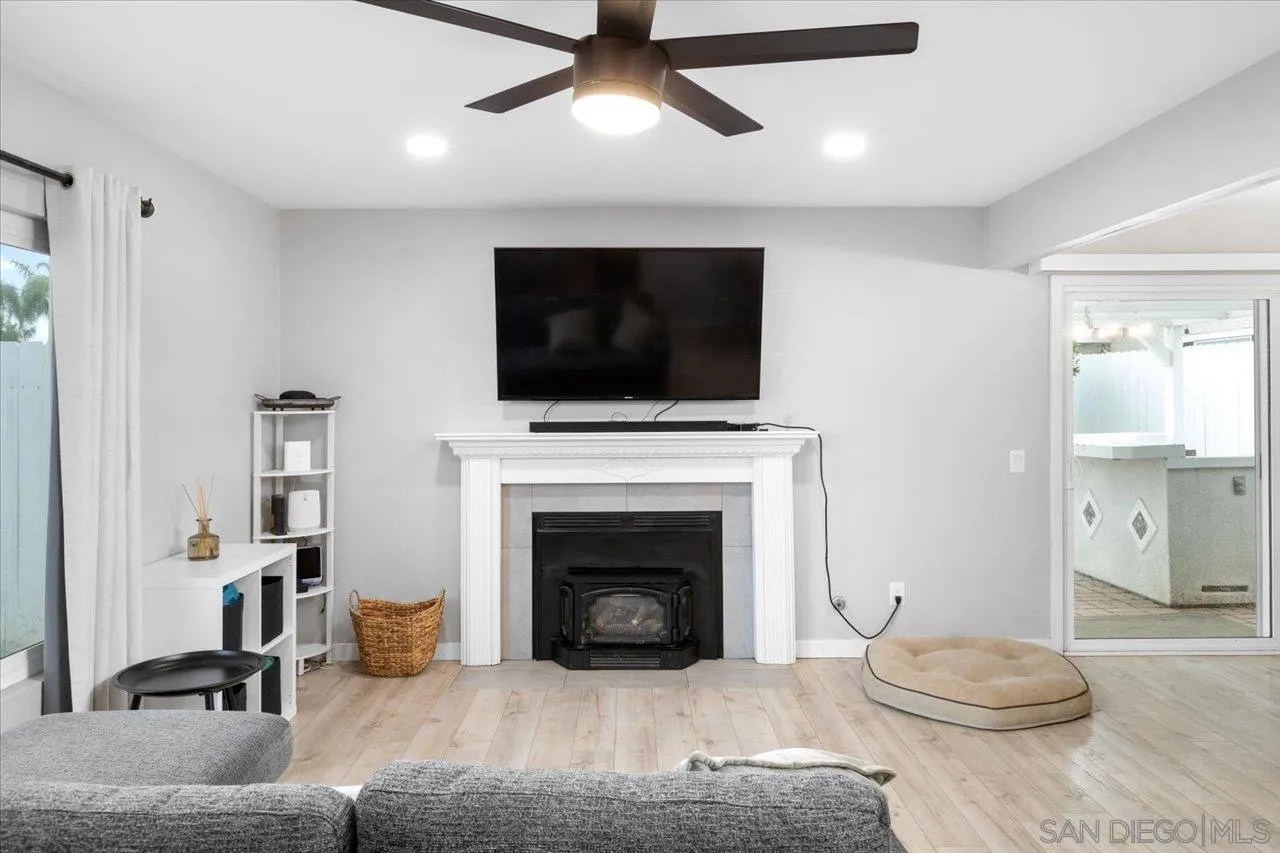 562 Tag Lane Ramona, CA 92065 - Photo 5 of 30 a living room with furniture and a fireplace