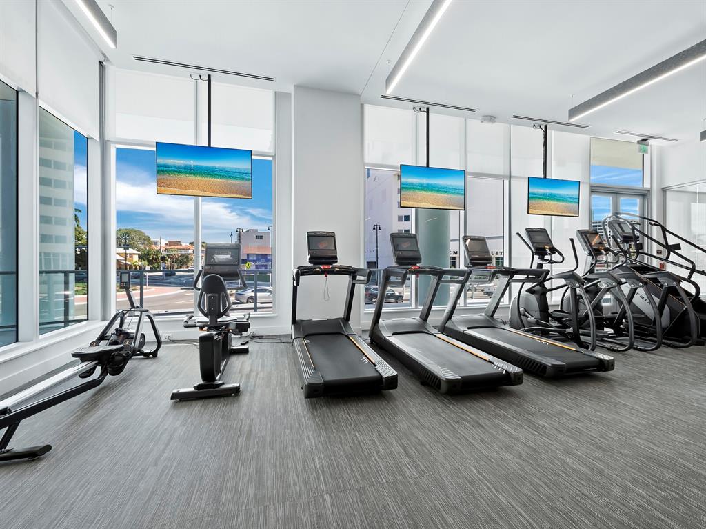 301 Quay Commons, Unit 1409 Sarasota, FL 34236 - Photo 23 of 45 a view of a room with gym equipment